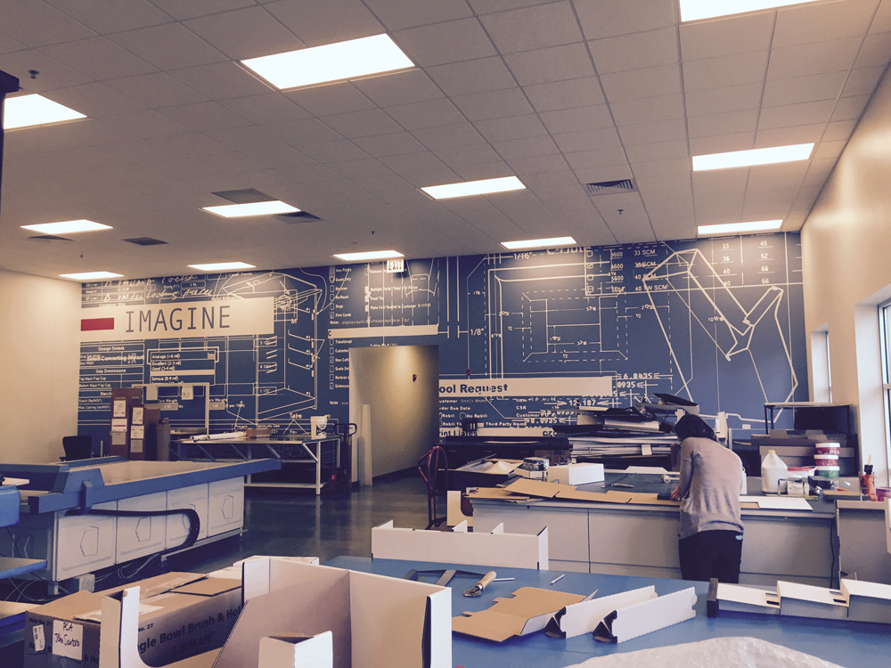 Commercial wallpaper installation in a modern office space